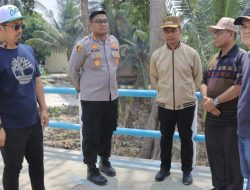 Kapolres Kampar Dampingi Bupati Kampar Cek Kesiapan Jembatan Merah Putih Presisi Menuju Peresmian”