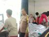 Dukung Ketahanan Pangan, Bhabinkamtibmas Polsek Bukit Raya Dampingi Kelompok Tani Ambil Satu Ton Pupuk Futura Presisi