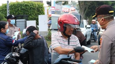 Antisipasi Dampak Asap Karhutla, Polda Riau Bagikan 2.500 Masker kepada Warga Pekanbaru